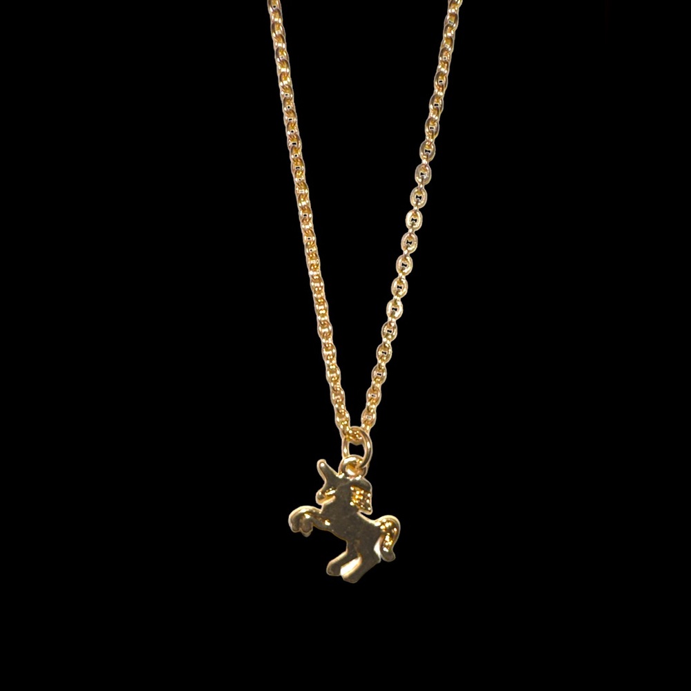 Charming Charlie gold tone unicorn necklace adjustable 15-18”